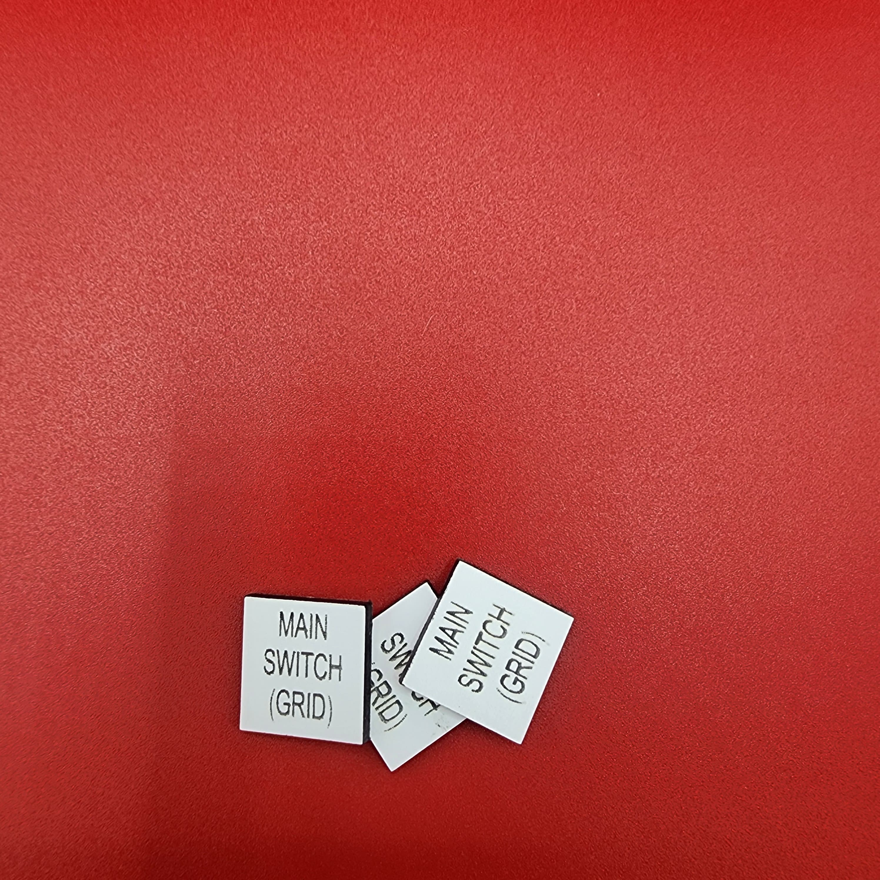 Batch of engraved switchboard labels — main switch identification